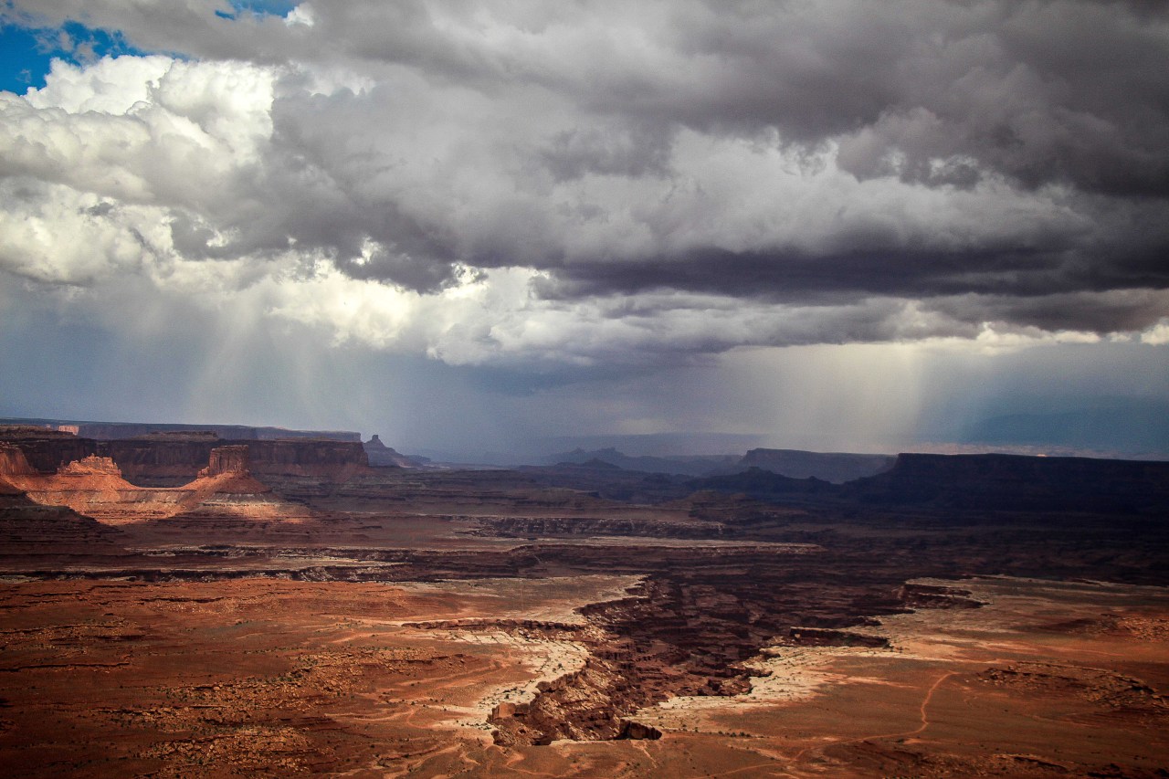 Rain falling over Canyonlands National Park outside of Moab