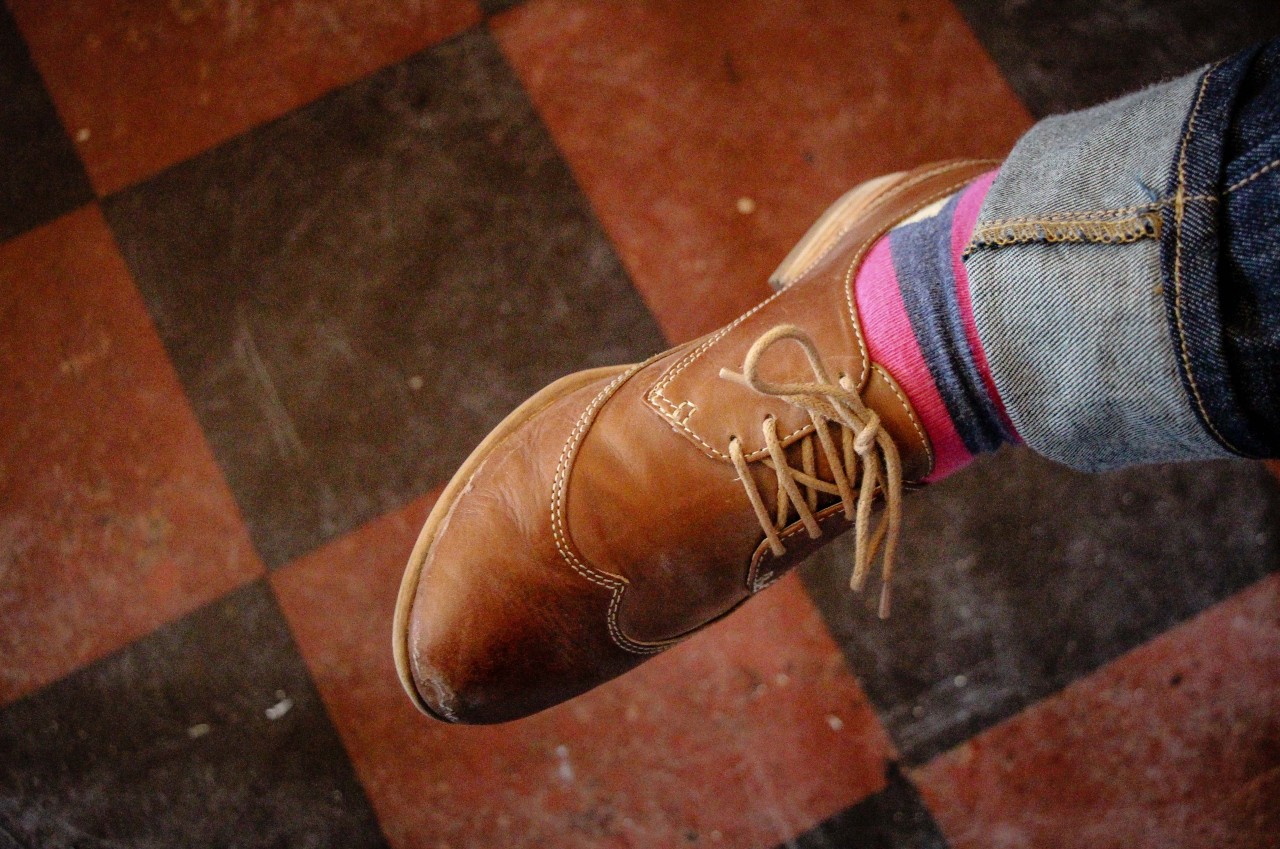 Kate’s left foot and the checkered floor at Bryant Lake Bowl.