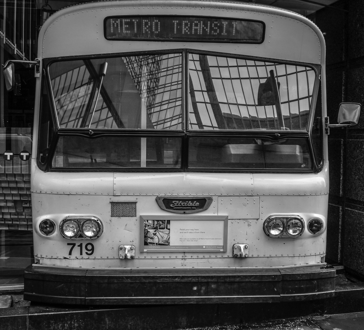 This Metro Transit bus is coming through the building. Downtown