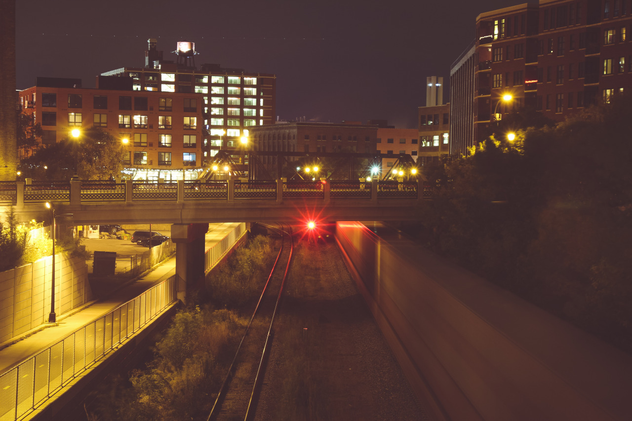 The North Loop railroad and an airliner landing at MSP across the sky.